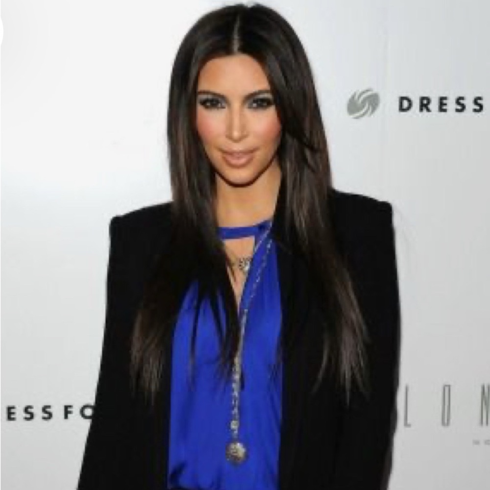 Royal blue Express cold shoulder balloon sleeve blouse.